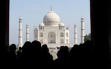 Visitors entering the gate at the northern edge of the ChowkI Jilo Khana forecourt get their first glimpse of the famed Taj Mahal.