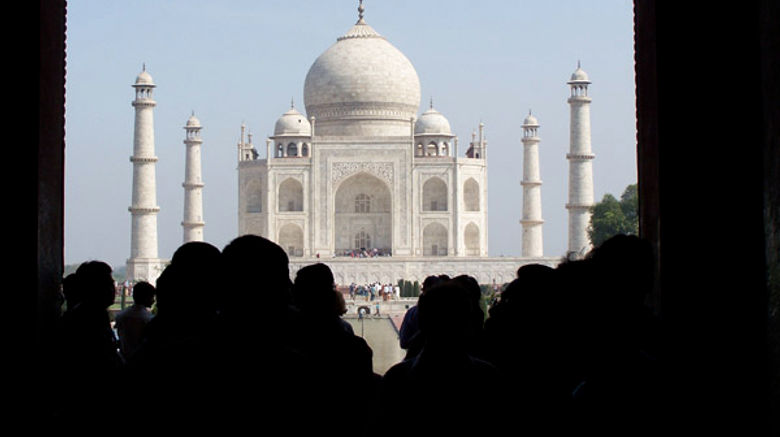 Visitors entering the gate at the northern edge of the ChowkI Jilo Khana forecourt get their first glimpse of the famed Taj Mahal.