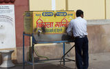 An outdoor public handwashing and water station in New Delhi. Water, especially of the potable kind, can become scarce in warmer weather.