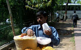 Indians love their street food. Here, a vendor prepares a nut, spice and bean mix at Raj Ghat, the cremation site of Mahatma Gandhi and Indira Ghandi.