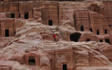 A lone visitor walks down the Street of Facades in Petra. (photo by Arnie Weissmann)