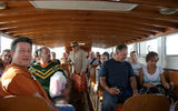 On the boat ride back from an optional lunch on the island of Burano, Italy, off of Venice.