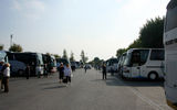 Tour buses crowd the parking lot in Sermione, Italy, an ancient peninsula town on Lake Garda in Italy.