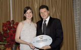 Imogene Thomson of the Australian Consulate General in New York accepts award from Arnie Weissmann, Travel Weekly editor in chief. (photo by Lisa Quinones/Black Star)