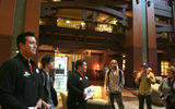 Adventures by Disney tour guides Michael (left) and Christian greet the "Lights, Camera, Magic!" guests in the lobby of Disney's Grand Californian Hotel & Spa.