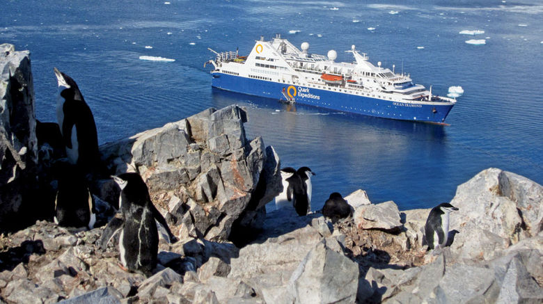 For those today who think there is nothing left to seek or nothing left untrammeled, Antarctica awaits -- serene, magnificent, empty, surreal and beautiful beyond words. And although the Seventh Continent is the world's most inaccessible, it is no longer a pipe dream for adventurers who place it high on their bucket lists. Pictured here, Quark Expeditions' 189-passenger Ocean Diamond. Photo by Lisa Maclean; posted July 1, 2014