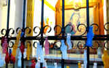 Colorful wax "ex votos," or votive offerings, at the Church of San Francisco, a pilgrimage site containing the tomb of Spanish-born saint Hermano Pedro de Betancourt.