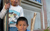 Young boys in the village of San Francisco de Sales peddle walking sticks to tourists about to climb Volcan de Pacaya.