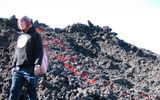 Atop Pacaya volcano, tourists are led within arm's reach of active streams of red-hot lava by local guides.