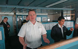 Capt. Carl Smith, left, contacted RCCL's emergency response team when he became aware of the earthquake and tsunami.
