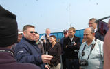 Captain Carl Smith explains how to use a sextant to passengers of the Quest before a call in Kagoshima, Japan.