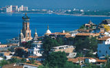 Puerto Vallarta is situated on the Bahia de Banderas (Bay of Banderas), which is bounded on the north by Punta Mita and on the south by Cape Corrientes.