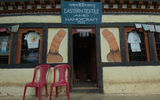 Phalluses painted around the entrance of a handicraft shop near Paro.