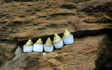 Tsa-tsas, containing small amounts of human ash, left on rocks near Drukgyal Dzong.