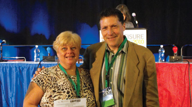 Among the prizewinners at the shows was Diane Monk of Deptford Travel Consultants, who won a stay at the Aria Resort and Casino in Las Vegas, courtesy of MGM Resorts. With her is Arnie Weissmann, Travel Weekly's editor in chief.