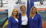 At the Nexion booth, from left: Wendy Graziano, Jackie Friedman and Paula Davenport.