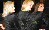 Terri Burke, Michelle Fee and Vicky Garcia show off their Cruise Planners hoodies.