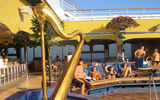 A harp adorns the pool deck on the Costa Pacifica.