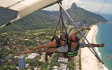 Beach Travellers guests hang gliding.