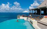 The pool area at the five-bedroom Katitche Point Greathouse on Virgin Gorda is the center of guest activity.