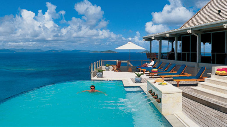 The pool area at the five-bedroom Katitche Point Greathouse on Virgin Gorda is the center of guest activity.