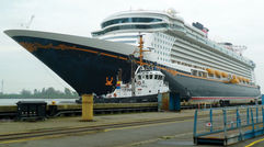 Despite overcast skies and a steady drizzle, thousands of onlookers flocked to the banks of the River Ems in Papenburg, Germany, to witness the float out of the Disney Dream.