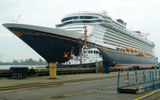 Despite overcast skies and a steady drizzle, thousands of onlookers flocked to the banks of the River Ems in Papenburg, Germany, to witness the float out of the Disney Dream.