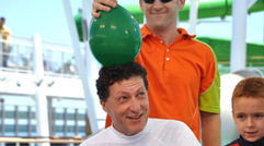 Without volunteering, Travel Weekly editor in chief Arnie Weissmann found himself a participant in Nickelodeon's Slime Time Live aboard the inaugural cruise of Norwegian Cruise Line Epic. Is the balloon filed with water or slime? Weissmann won't know until after his attempt to makes his way through a 36-word tongue-twister.
