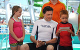 Weissmann watches a young teammate successfully get through his challenge.