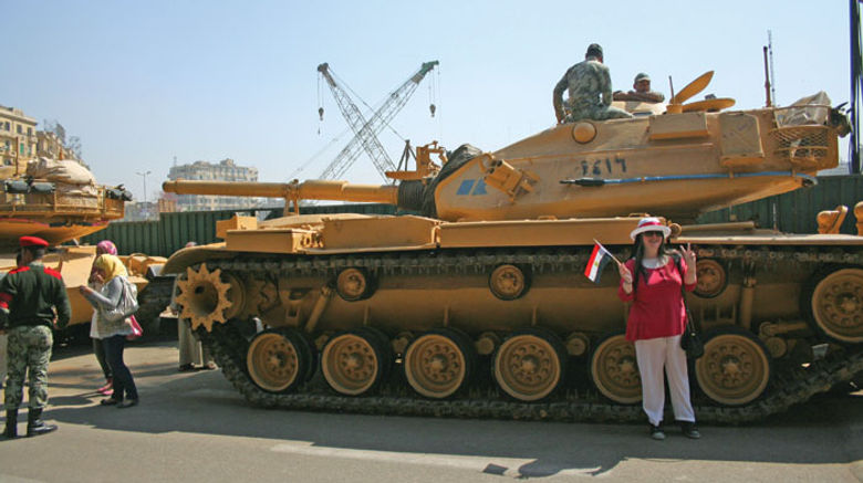 Travel Weekly's Michelle Baran was in Egypt for one week following the country's 18-day revolution, which prompted the evacuation of hundreds of U.S. citizens out of the country last month. Pictured here, a tourist poses in front of one of the tanks stationed at the entrance to the Egyptian Museum.