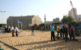 Students mill about in the area that was a makeshift tent city in Tahrir Square during what became known as the "Youth Revolution."