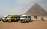 The parking lot at the pyramids, normally packed with motorcoaches, now hosts just a handful of tourist vans.