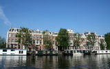 Houseboats along the Amstel River, after which the city is named.