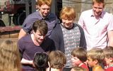 Harry Potter film stars Daniel Radcliffe and Rupert Grint (front) and James & Oliver Phelps (rear) greet Texas first-graders A warm welcome on opening day at The Wizarding World of Harry Potter, Universal Resort Orlando. June 18, 2010.