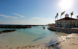 The property’s private beach, which spans its entire coastline, incorporates white sand taken from Isla Mujeres.
