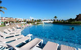Pools, bridges and cascades blend with the Riviera Maya’s blue skies.