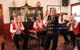Gypsy entertainers, often a part of planned tours in Hungary.