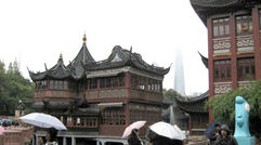 Shanghai, old and new: Pudong skyscrapers loom behind the Yuyuan Gardens bazaar.