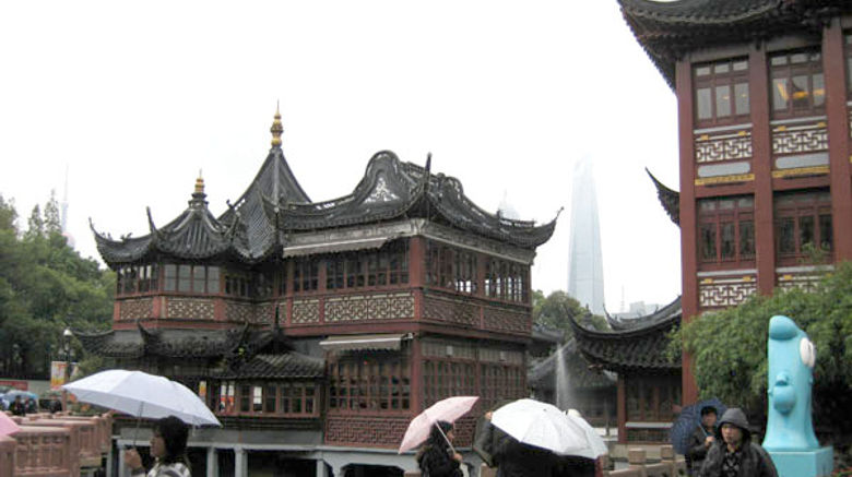 Shanghai, old and new: Pudong skyscrapers loom behind the Yuyuan Gardens bazaar.