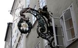 Before people could read, shops hung out a sign indicating what they did (shoe for cobbler, etc.). Keeping up the tradition in Salzburg was this McDonald's!!!