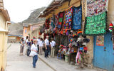 The group checks out local handicrafts in Ollantaytambo's main square.