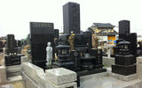 Grave markers on a cemetery that was in the tsunami's path have all been replaced by new markers. The markers sit over urns containing the created ashes of the deceased, which were not affected by the tsunami. Photo by Arnie Weissmann