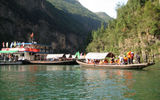 Tourists board sampans explore the narrow Three Little Gorges on the Danang River, a Yangtze tributary.
