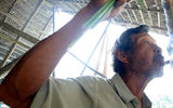 A medicine man performing a ceremonial ritual for good health and happiness.