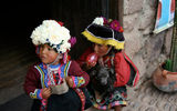 Girls in local dress at the market in Pisac.