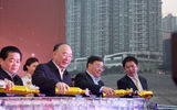 The mayor of Chongqing (second from left), and Century President Peng Jian Hu (far right), along with other dignitaries, preside over the ship launch festivities.