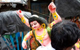 Preparing for the Durga Puja festival, during which images of the Goddess Durga are paraded around and thrown into the river.