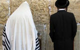 Men worship at the Western, or Wailing, Wall -- holiest site in Judaism.