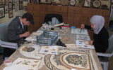 Young trainees in the traditional art of mosaic making at the Philadelphia mosaic gallery in Madaba, Jordan.