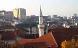 View of rooftops and a small minaret in the early morning, in Pristina, Kosovo’s capital.